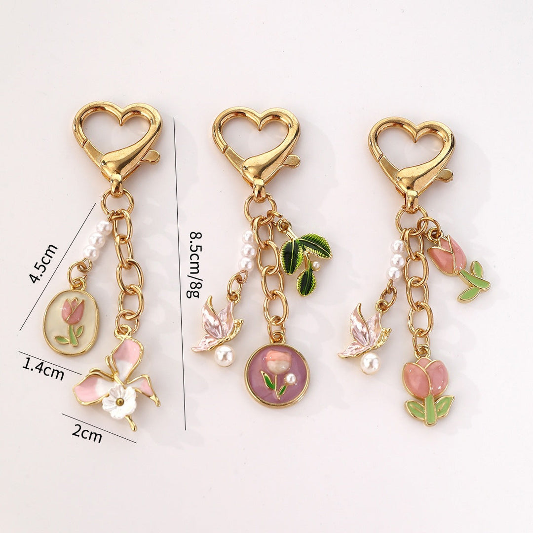 Floral rose bag charm for women, an elegant purse accessory & thoughtful gift idea. Metal keychain.