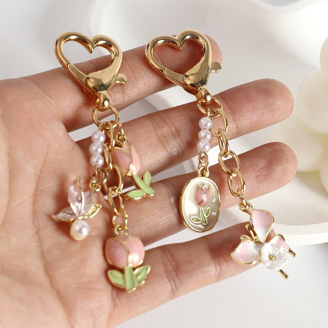 Colorful enamel & metal rose flower keychain, a women's elegant accessory for bags & keys.