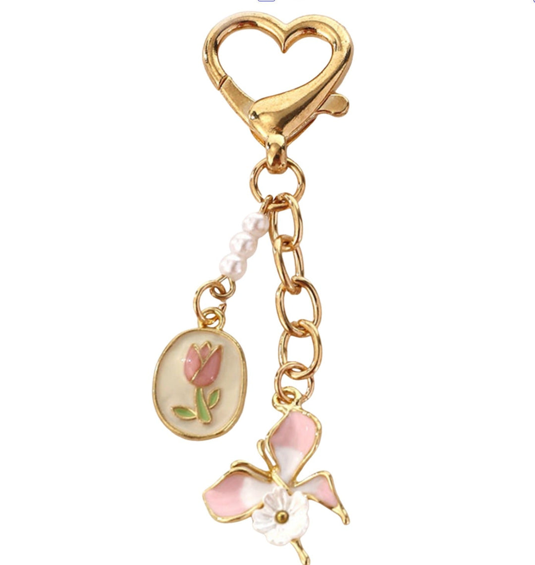 Vibrant rose flower keychain, an elegant women's accessory for bags & keys, made of metal.