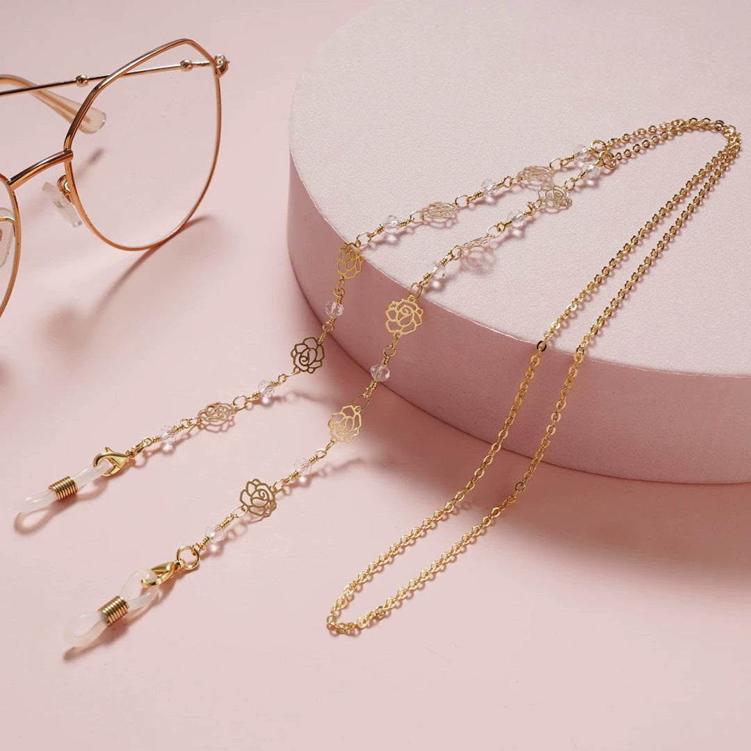 Elegant rose gold glasses holder chain with delicate floral design, perfect for keeping eyewear secure and stylish.