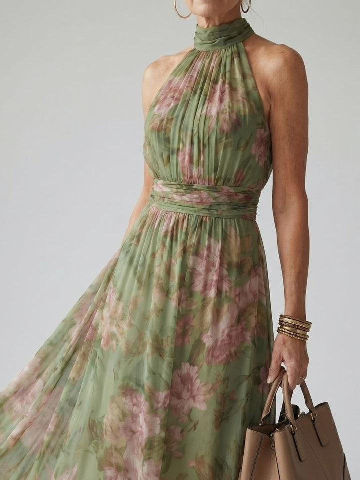 Breezy floral print halter midi dress for women, ideal as a casual or elegant summer outfit.
