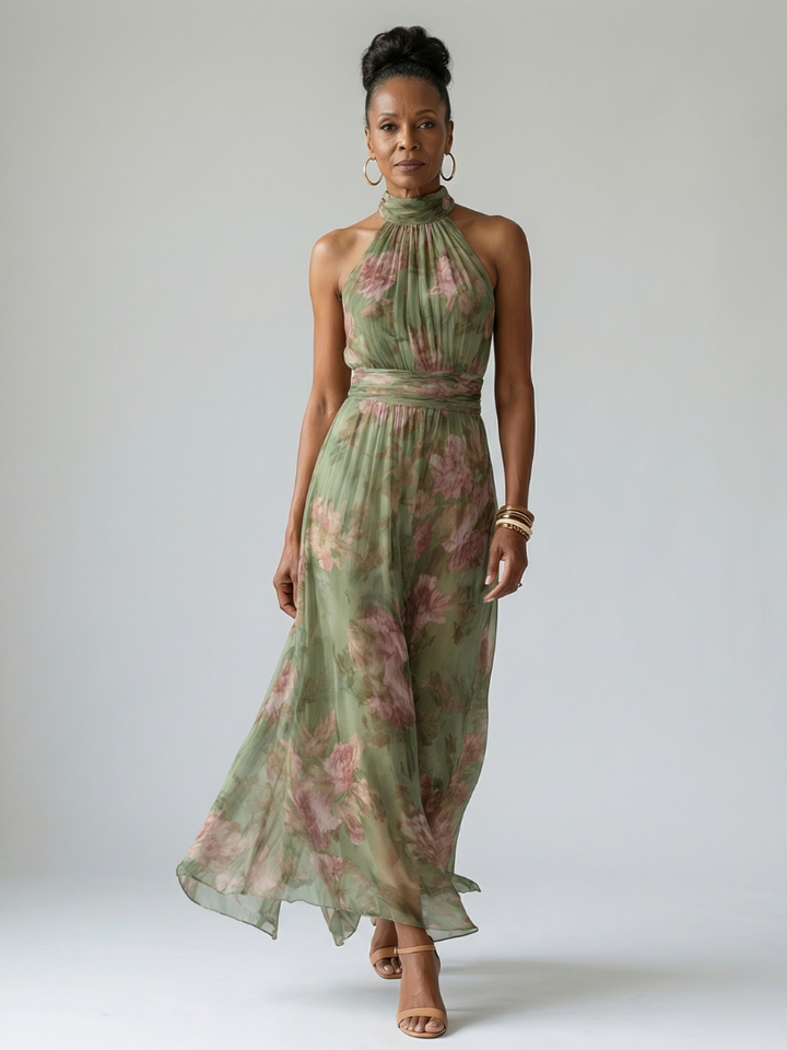 Women's gathered halter midi dress in sage green, a flattering, casual yet elegant summer style.