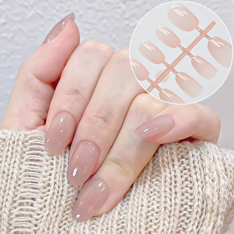 Elegant short almond press-on acrylic nails for women. Perfect for a quick DIY manicure, offering a chic look.