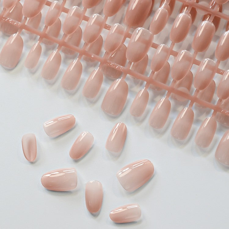 Short almond acrylic press-on nails for women. Stylish fake nails, ideal for elegant nail art & beauty.