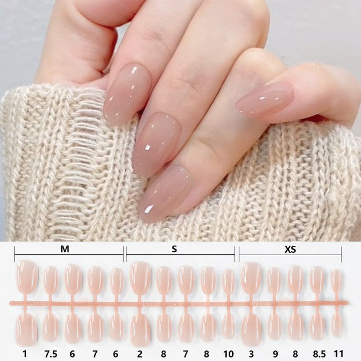 Women's elegant short almond acrylic press-on nails. Quick fake nails for easy DIY nail art & beauty accessories.
