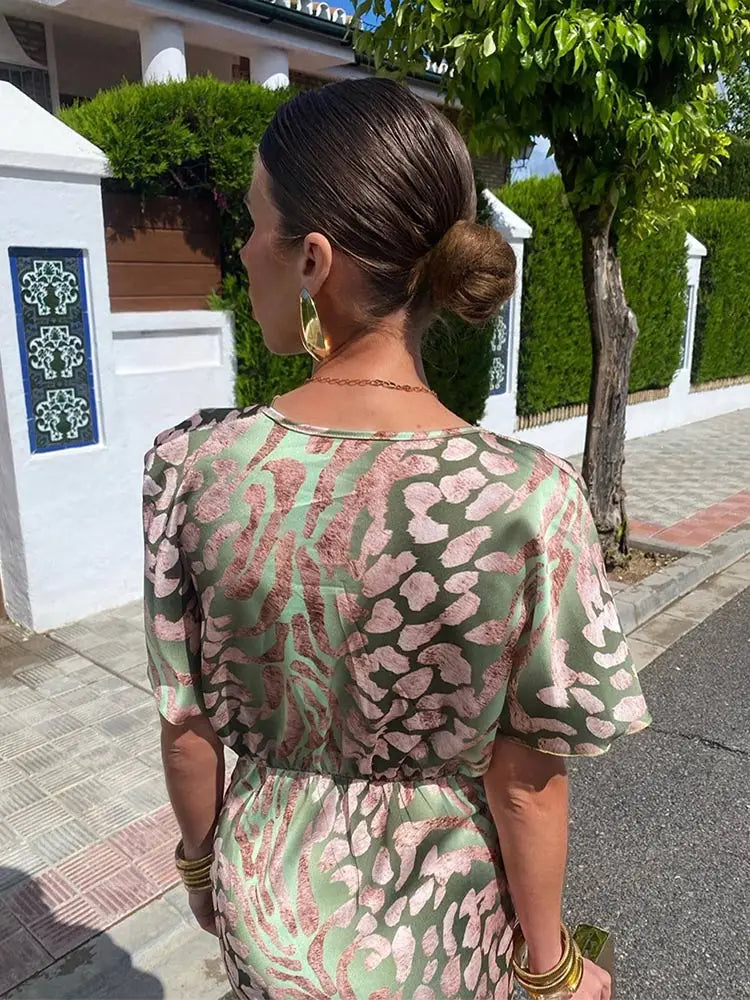 Timeless women's elegant wrap midi dress with short sleeves, ideal for evening, cocktail, or formal events.
