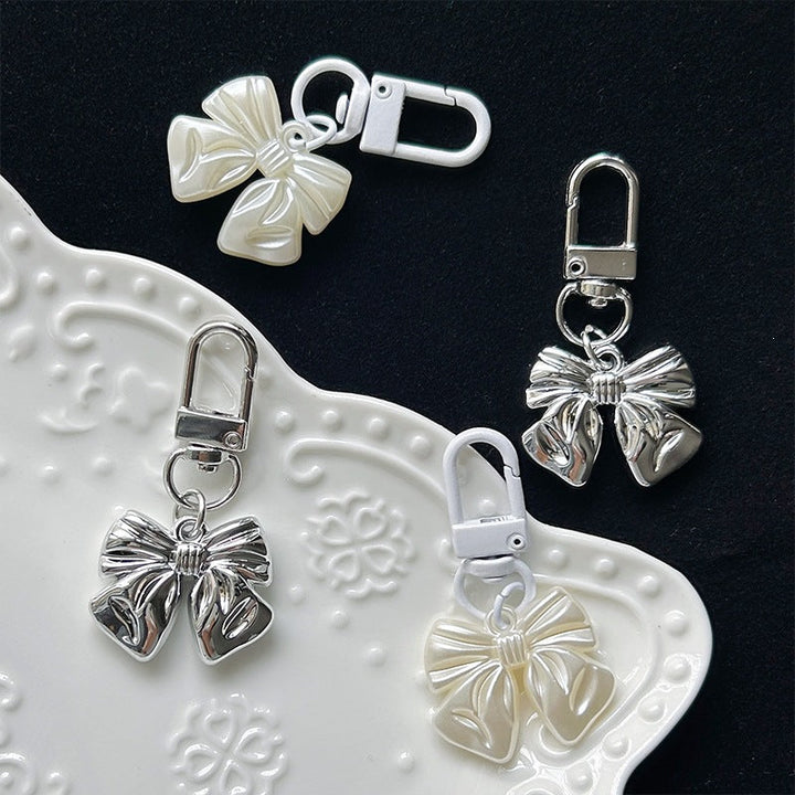 Chic bow pendant charm featuring a smooth, polished finish, an ideal women's jewelry accessory for gifting.