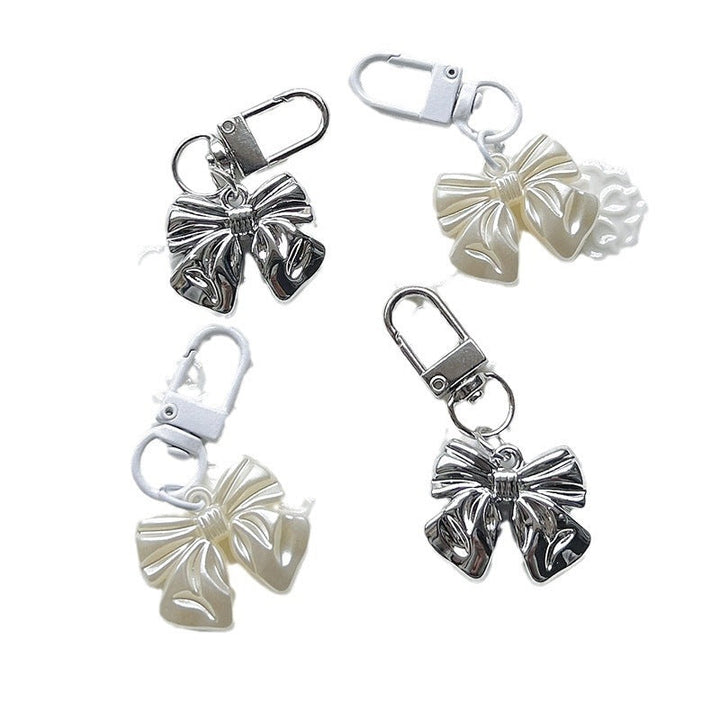 Versatile fashion bow charm, a perfect accessory to elevate women's handbags, necklaces, and keychain styles.