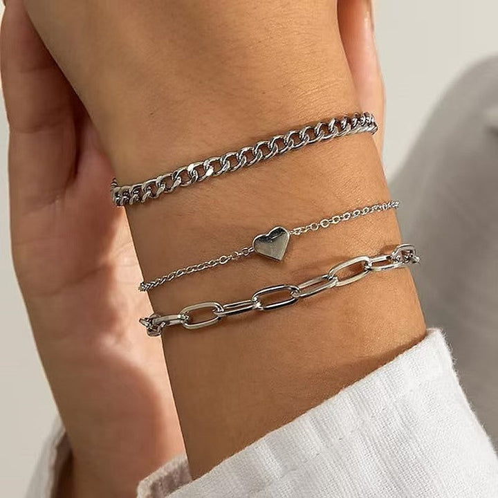 Women's layered gold & silver chain bracelet set, adjustable. Perfect elegant jewelry gift for her.