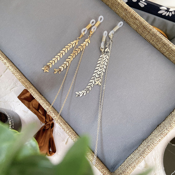 Elegant silver leaf drop statement earrings for women. Hypoallergenic jewelry, perfect for formal events.