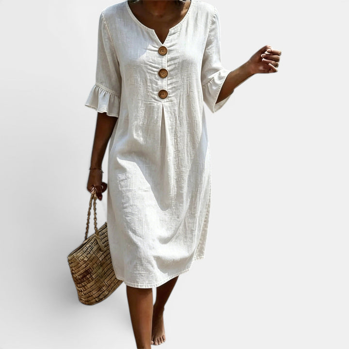 White women's elegant midi dress, a casual button-front style for comfortable everyday wear & summer fashion.