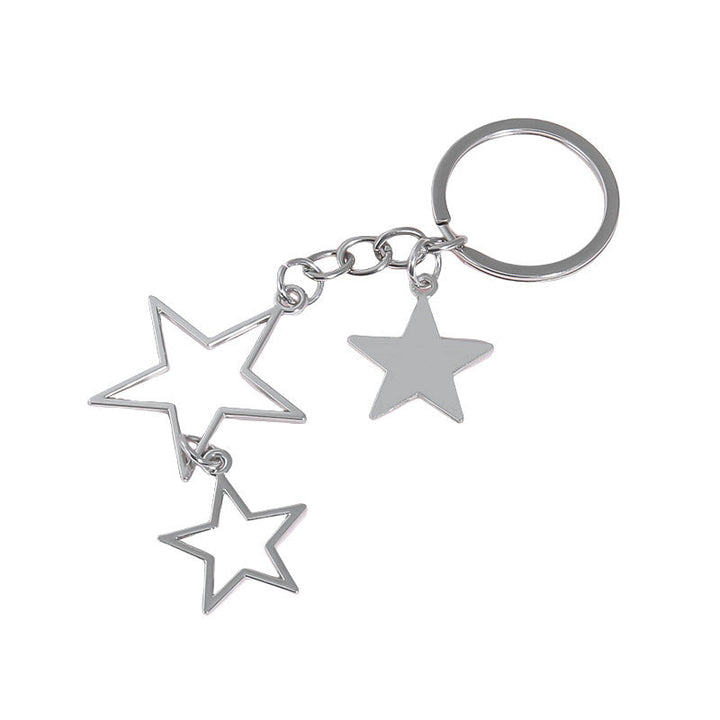 Gorgeous star keychain gift for women. Elegant sparkling metal accessory, ideal for keys, bags, or gifts.