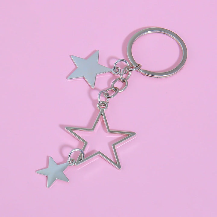 Luxury star key ring. Stylish women's sparkling accessory with a star design, perfect for keys or handbag decoration.