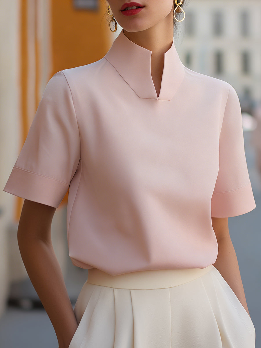 Comfortable women's short sleeve stand collar blouse, versatile for work, office, or business casual.