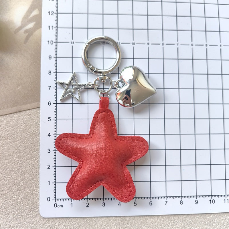 Decorative faux leather star & heart charm, perfect for keys or as a chic bag accessory gift.