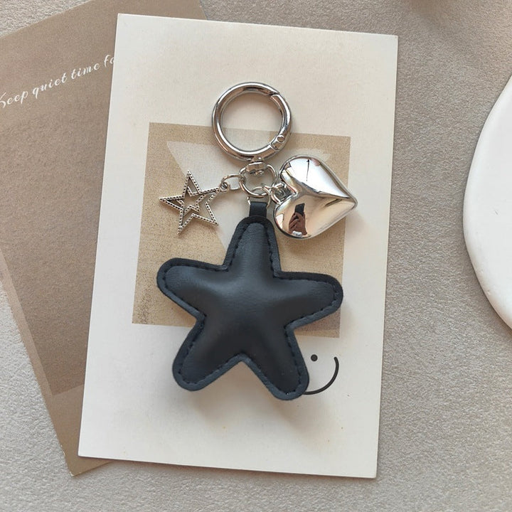 Gift-ready star & heart charm, an elegant key holder and bag accessory for all occasions.