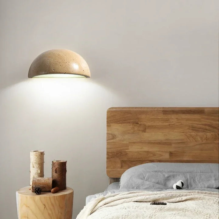 Artistic stone LED wall lamp, ideal for bedroom or living room lighting. Modern, energy-efficient decorative light.