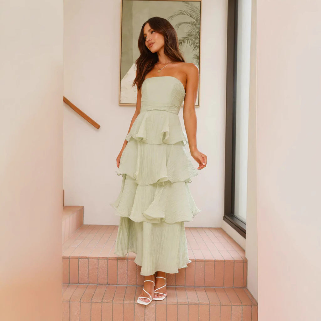 Stylish women's strapless maxi dress with tiered ruffles, ideal formal wear for weddings & parties.