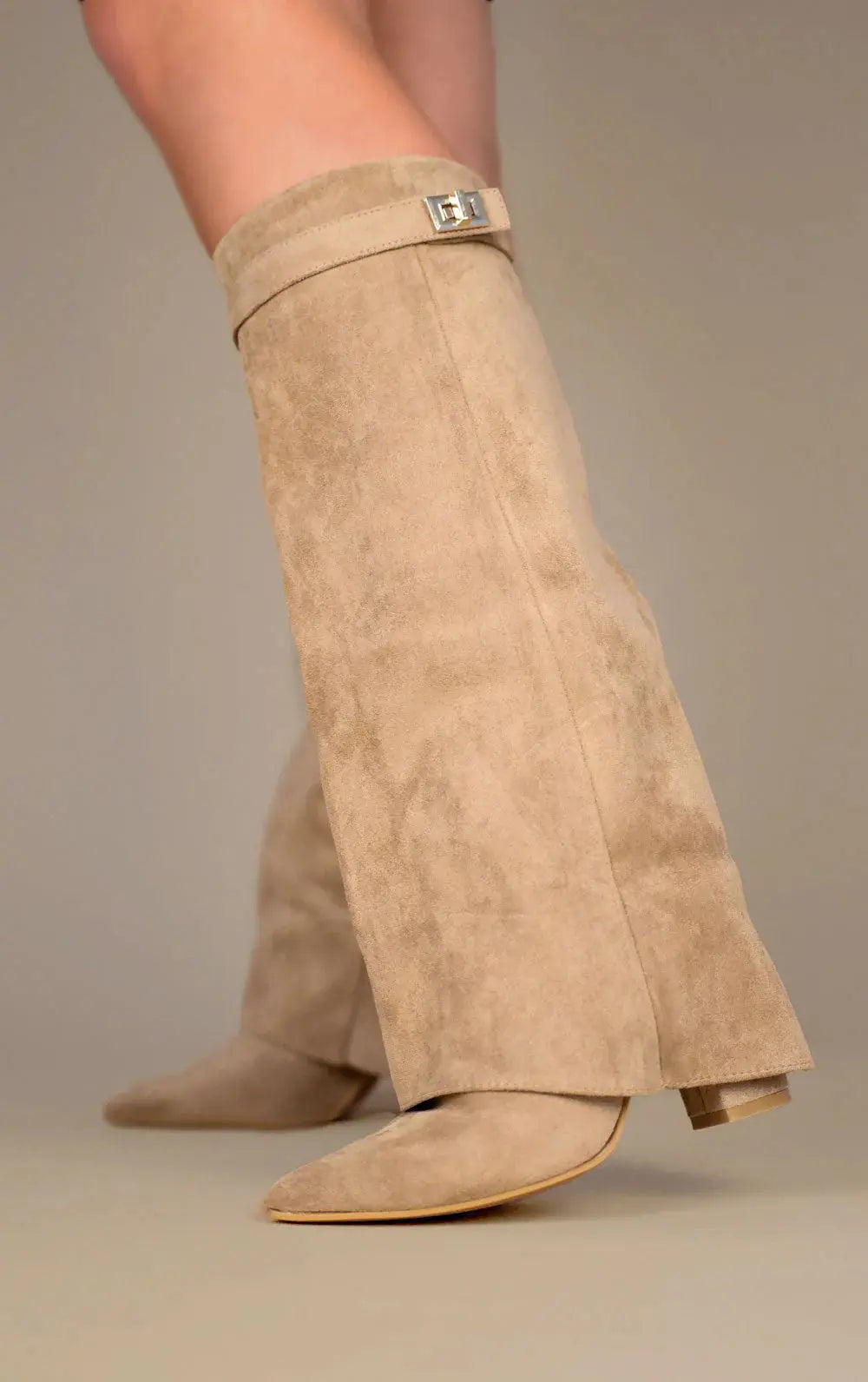 Fashionable winter tall boots for women, combining warmth, style, and refined elegance.