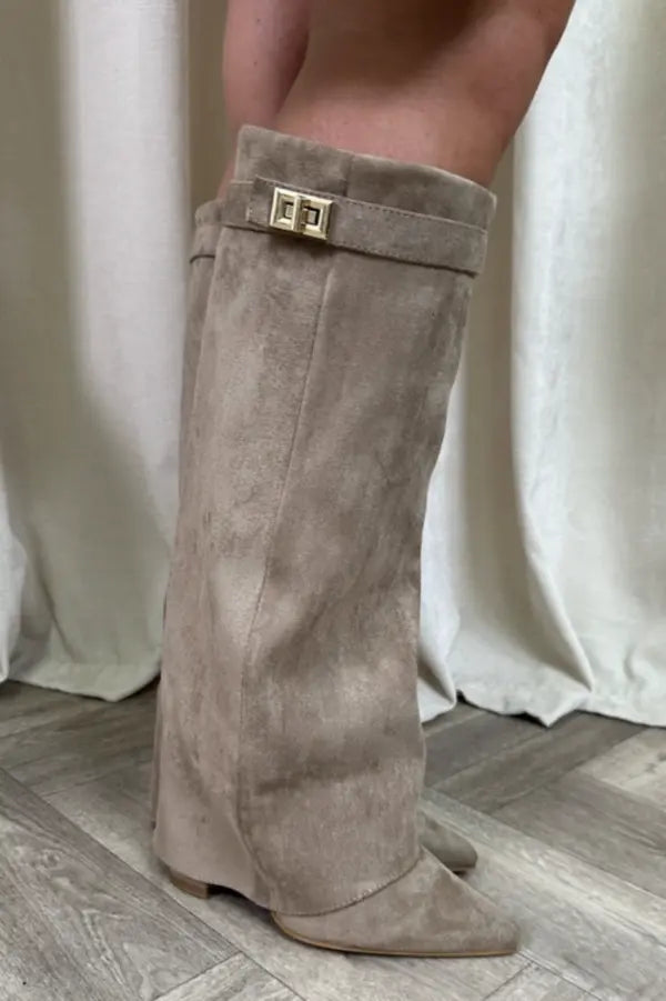 Refined tall women's boots, exuding elegance with a sleek design and comfortable fit.