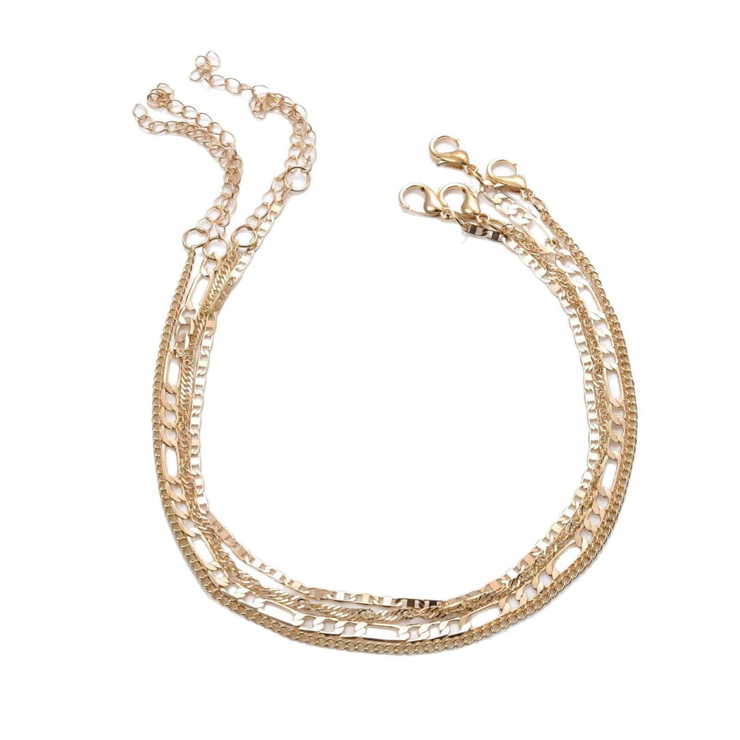 Modern three-strand link bracelet for women; an adjustable and stackable jewelry item.