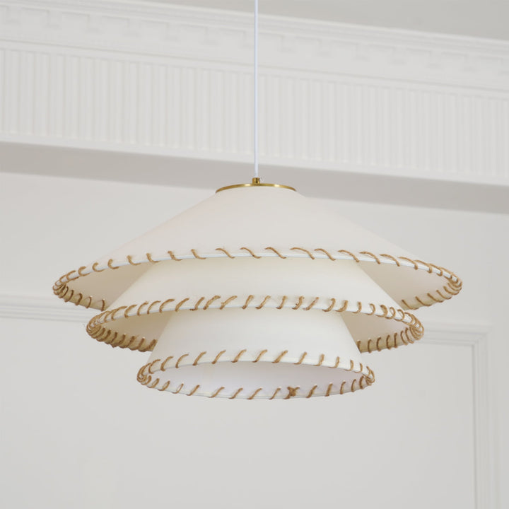 Bohemian tiered pendant fixture, a modern sculptural design for indoor ambient light.