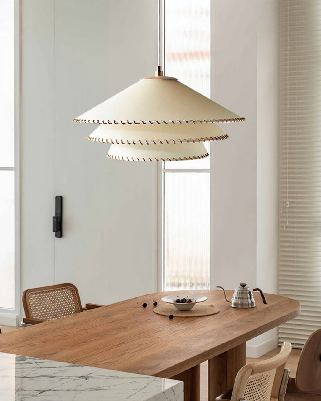 Chic tiered pendant lamp, providing elegant ambient light for contemporary interiors.