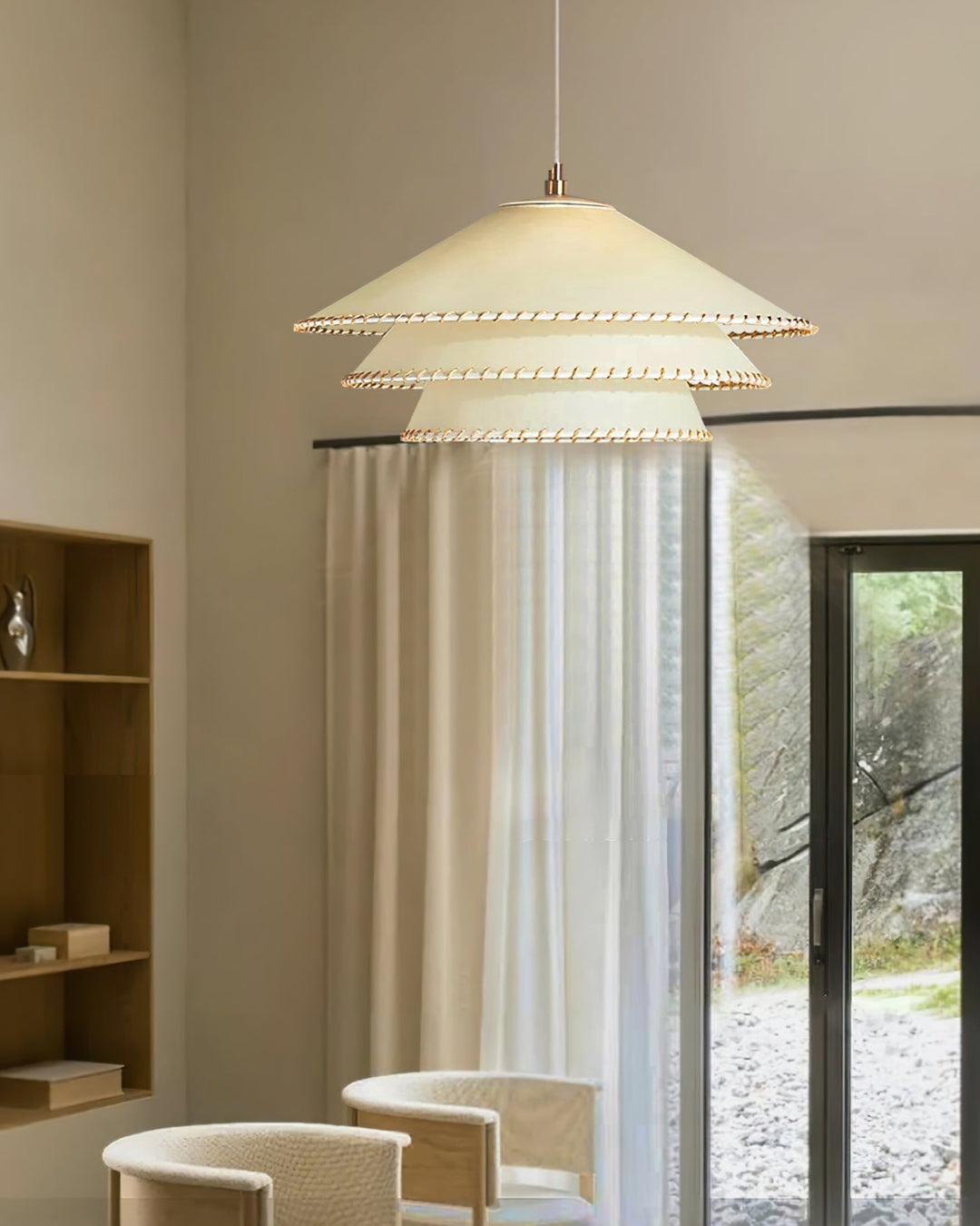 Modern elegant tiered ceiling light, a sculptural piece for sophisticated home decor.