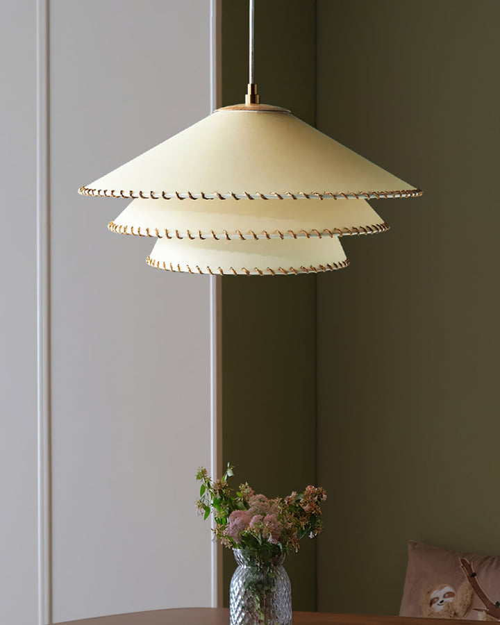 Bohemian beige tiered pendant lamp, an elegant modern lighting solution for any room.