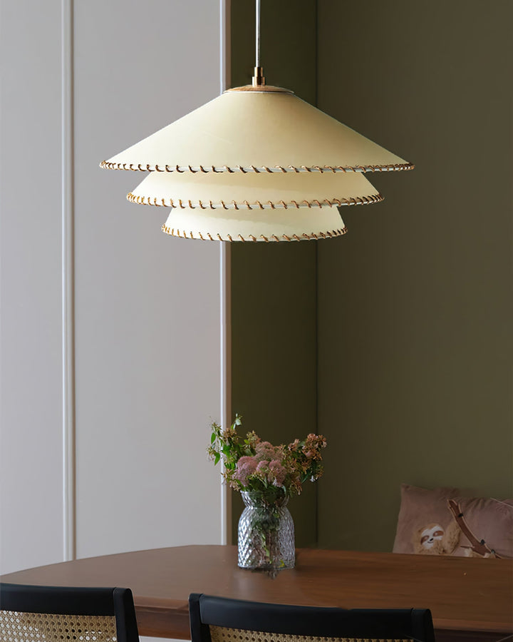 Sophisticated tiered pendant light, casting ambient light with its unique sculptural design.