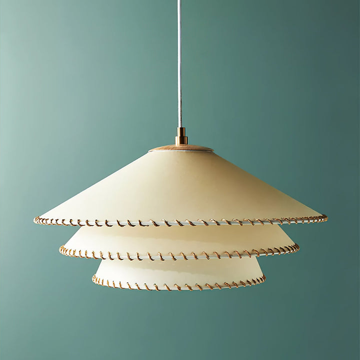 Elegant tiered pendant light, a versatile modern fixture for both bohemian and contemporary homes.