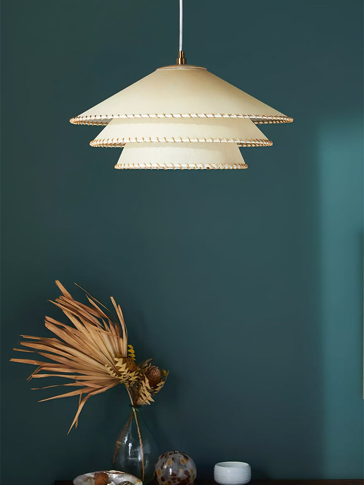 Bohemian modern tiered pendant light, providing elegant and soft indoor ambient lighting.