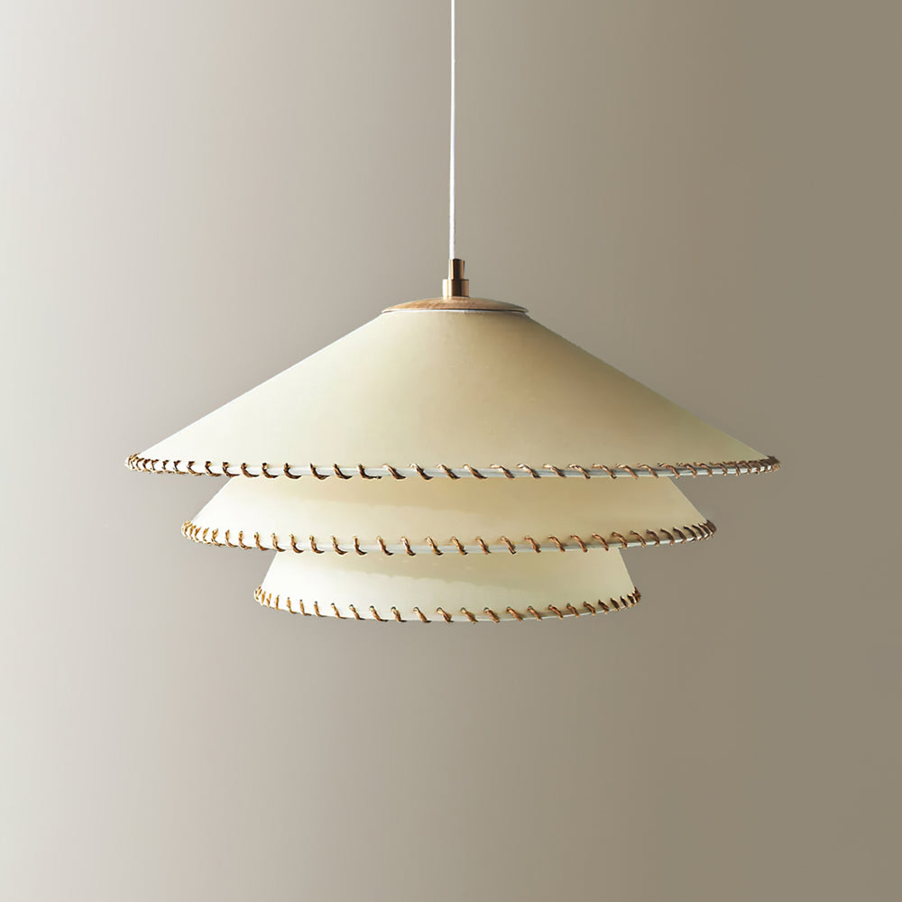 Elegant tiered pendant lamp, casting beautiful ambient light, a perfect modern home decor piece.