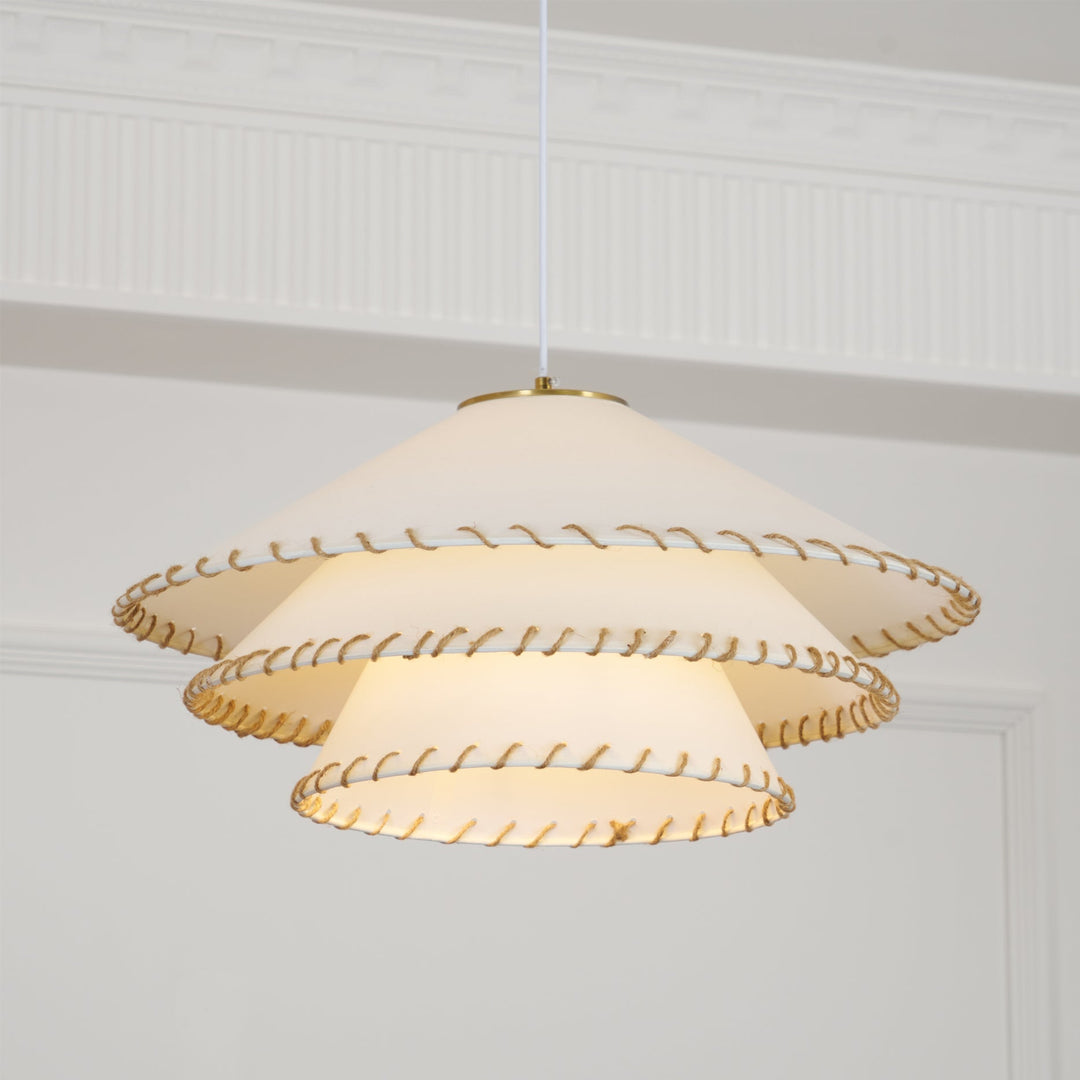 Sculptural tiered lighting fixture, a modern bohemian style pendant lamp for indoor use.