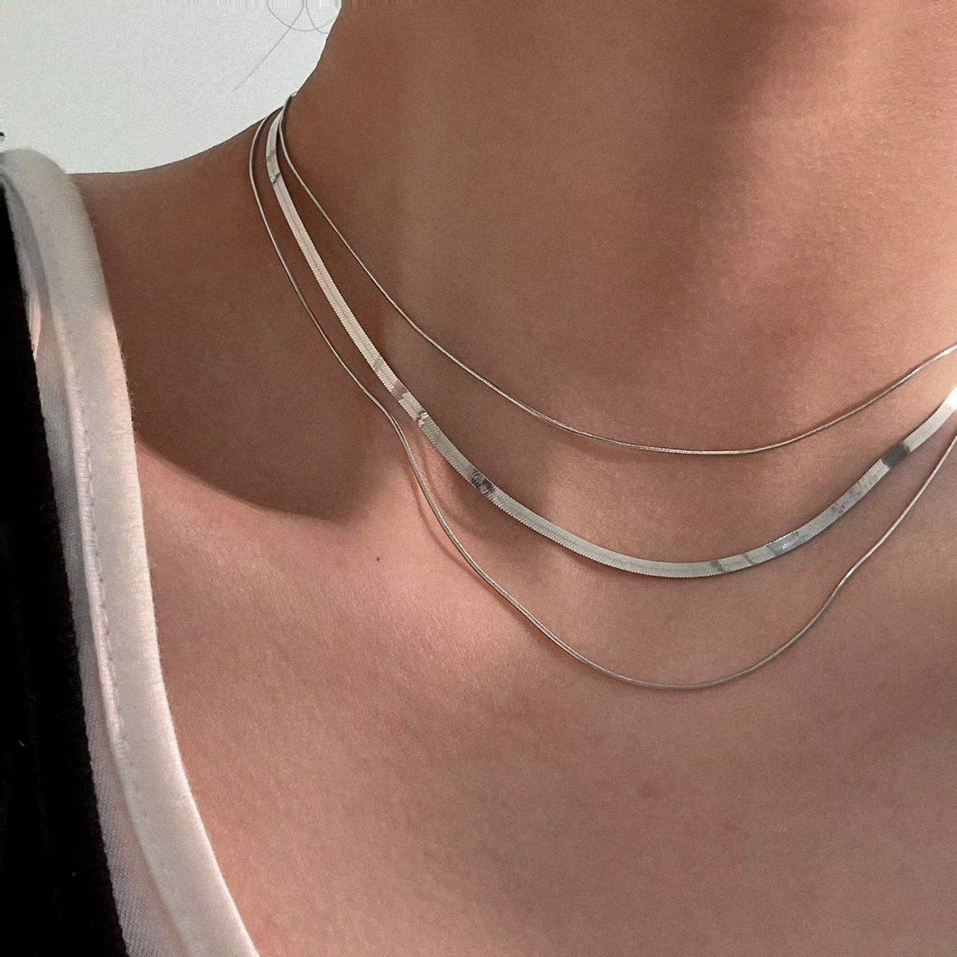 Versatile silver triple layered chain necklace, women's elegant stainless steel jewelry.