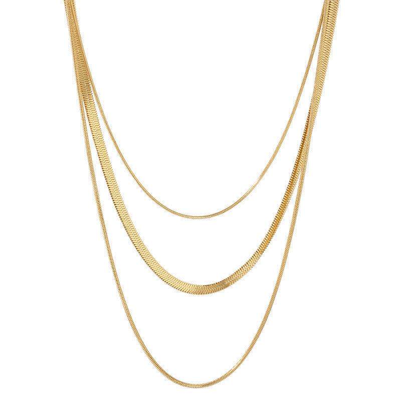 Stylish women's triple layered necklace, delicate gold chains. Perfect fashion accessory, stainless steel.