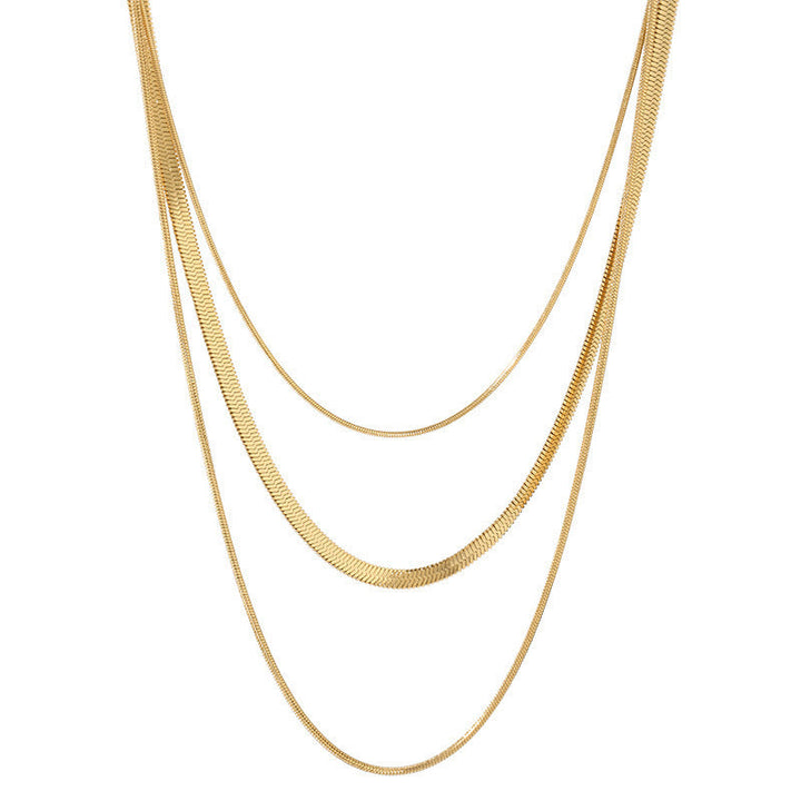 Stylish women's triple layered necklace, delicate gold chains. Perfect fashion accessory, stainless steel.