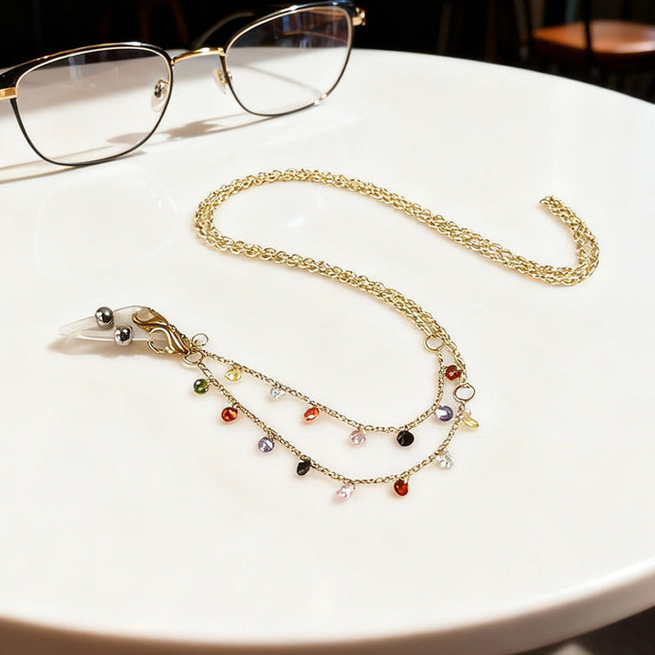 Fashionable unisex crystal spectacle chain, a chic eyewear accessory.