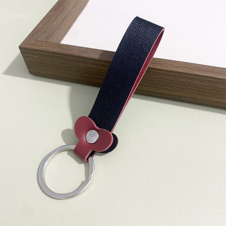 Practical yet elegant floral leather keyring for keys, a lovely accessory.