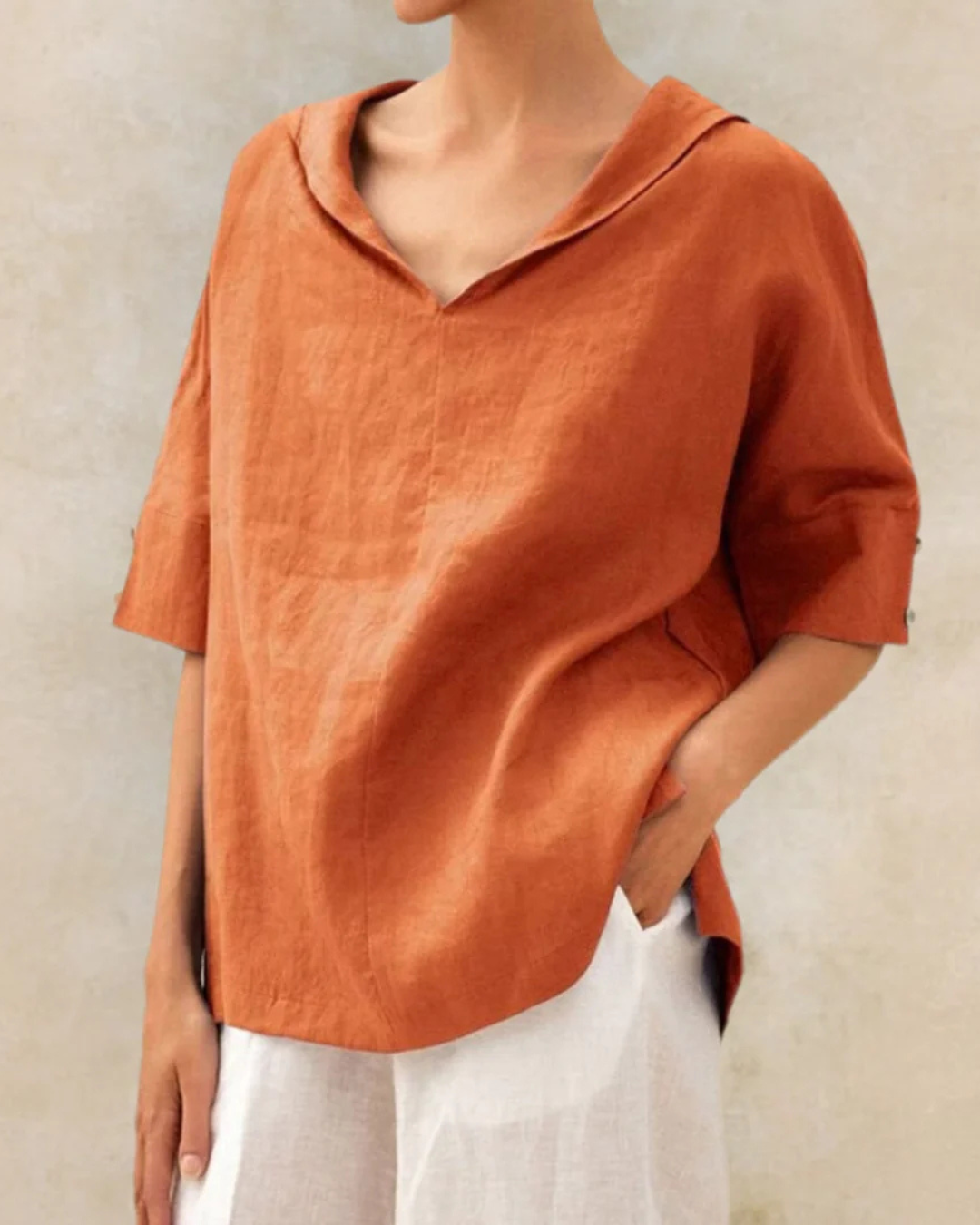 Chic V-neck half sleeve women's blouse, perfect for stylish spring & summer fashion apparel.