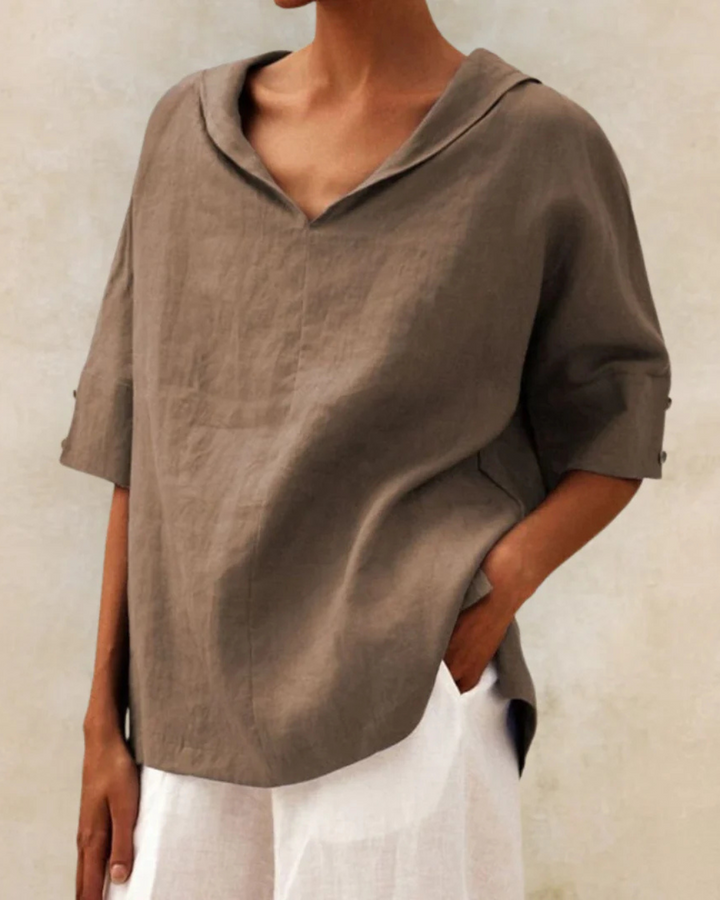Women's V-neck half sleeve blouse, a versatile and stylish top, perfect for any casual or dressy day.