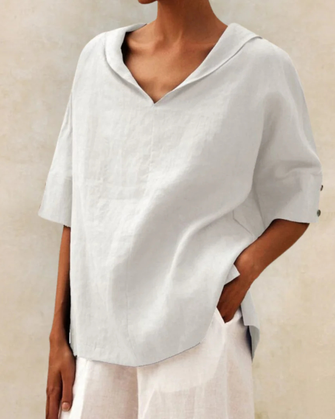 Elegant women's half sleeve V-neck top. This chic casual blouse is perfect for versatile spring/summer fashion.