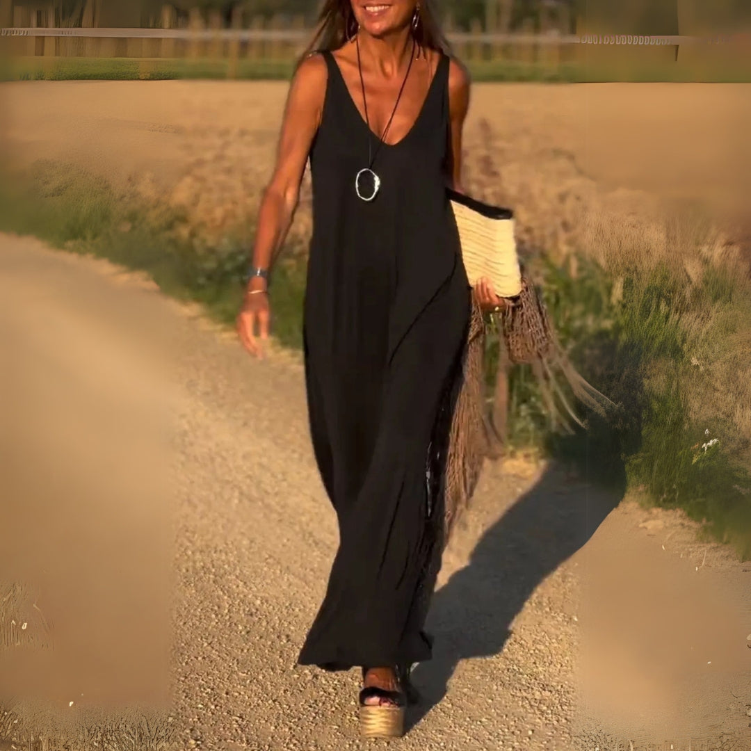 Flowy long V-neck maxi dress for women, suitable for elegant casual chic or party wear.