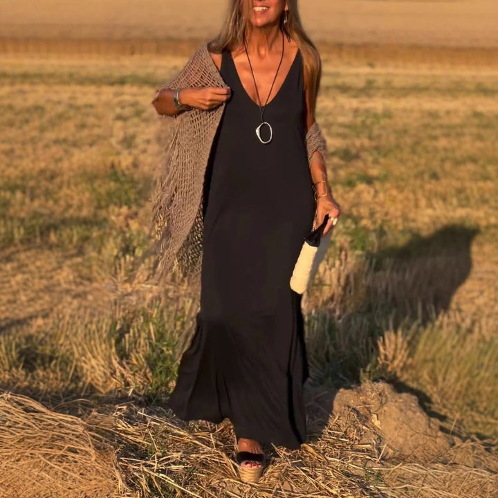 Women's elegant V-neck long maxi dress, a flowy summer party dress for casual chic style.