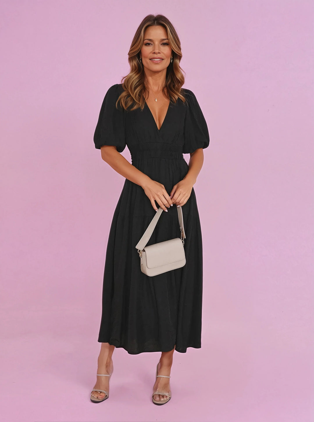 Elegant V-neck midi dress for women, featuring chic puff sleeves and a flattering smocked waist.
