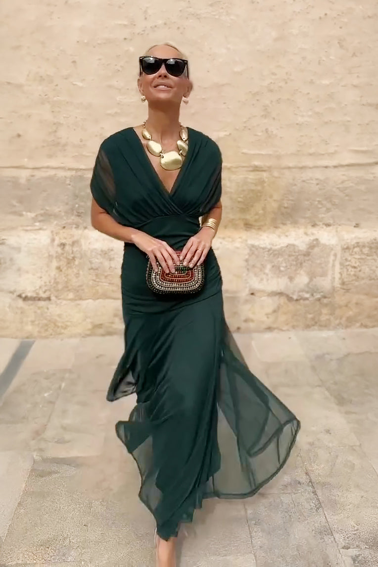 Women's flowy V-neck maxi dress, ideal for special occasion parties & elegant evening events.
