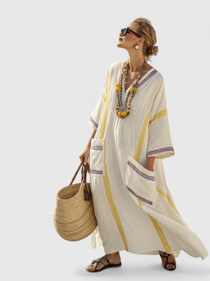 Women's V-neck striped maxi dress, a comfortable & flowy kaftan perfect for summer beach style.