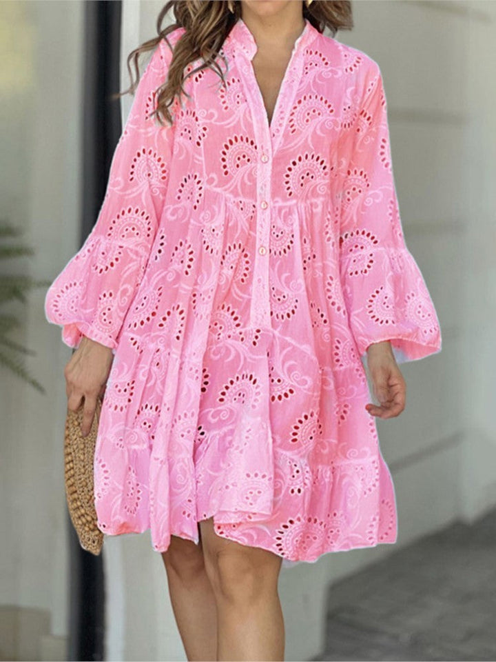 Casual women's summer mini dress, V-neck, tiered skirt, and beautiful embroidery; comfortable fashion.