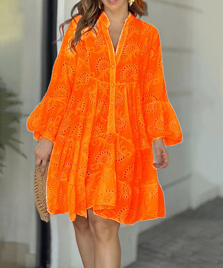 Embroidered V-neck mini dress for women, tiered design, bell sleeves, perfect for summer parties.