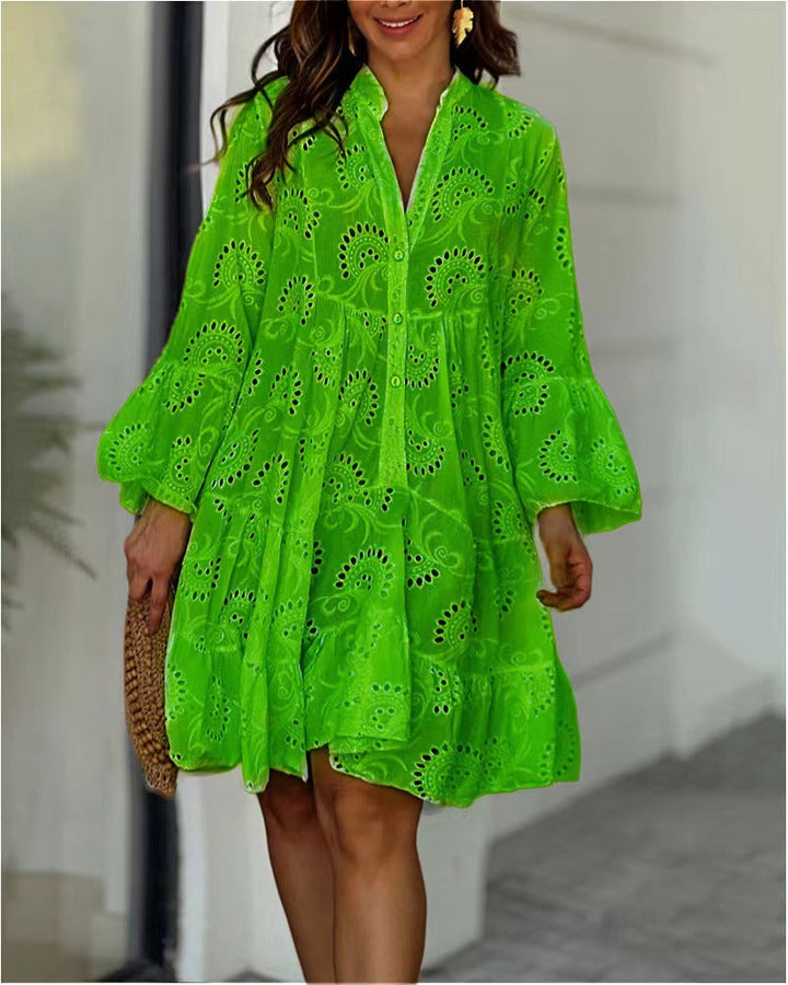 Flowy tiered mini dress for women, embroidered V-neck, bell sleeves; chic, comfortable, and elegant.